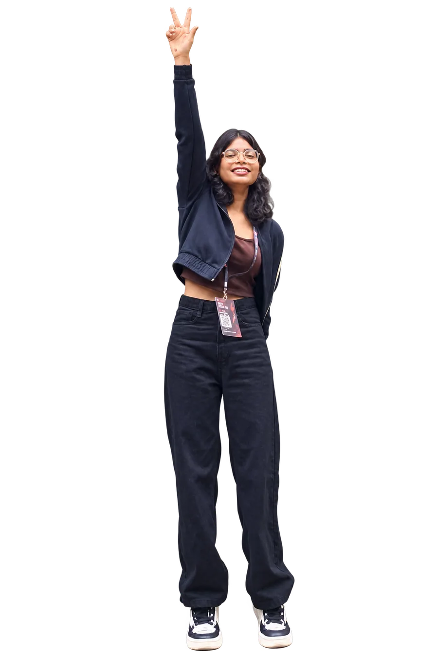 nidhi, one hand up in a peace sign, holding the end of the thread