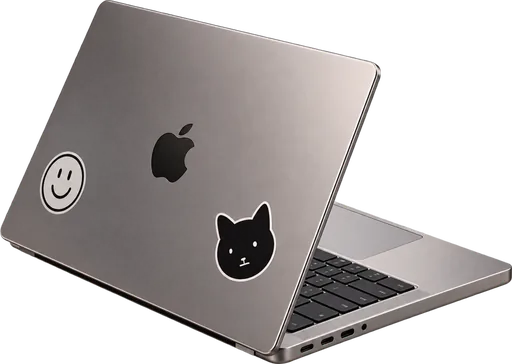 a laptop covered in stickers